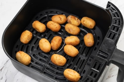 Cooked mini corn dogs in air fryer