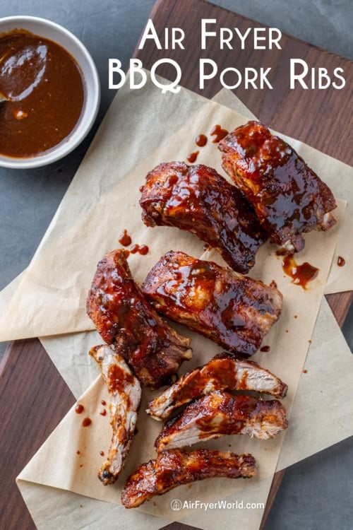 air fryer ribs on board with sauce dizzled 