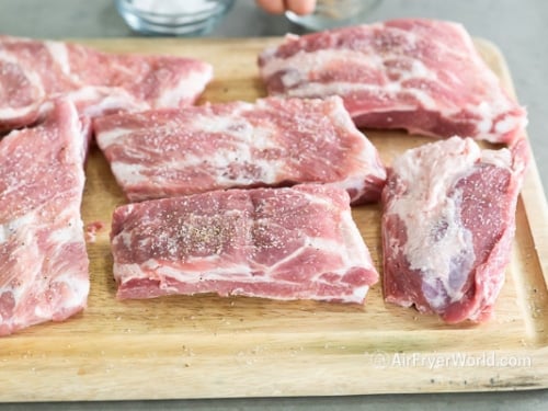 Seasoned ribs on cutting board