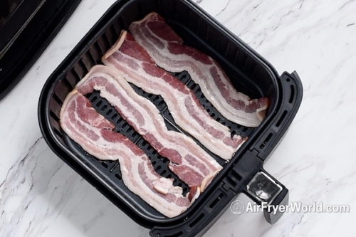 Uncooked bacon in air fryer