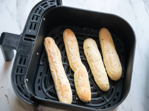 Placing Frozen Breadstick in Basket