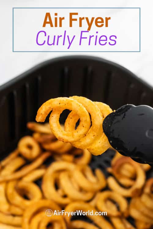 cooked curly fry held in tongs