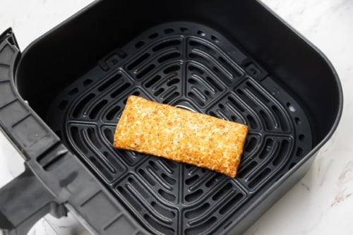 Cooked hot pocket in air fryer basket