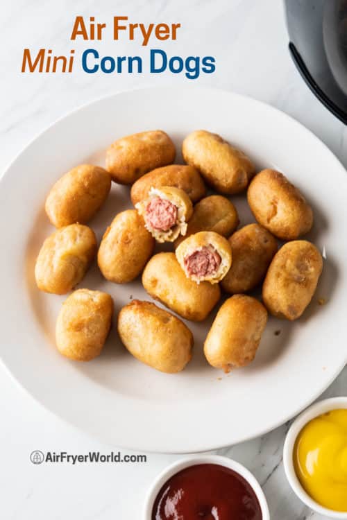 Mini corn dogs on a plate with ketchup and mustard