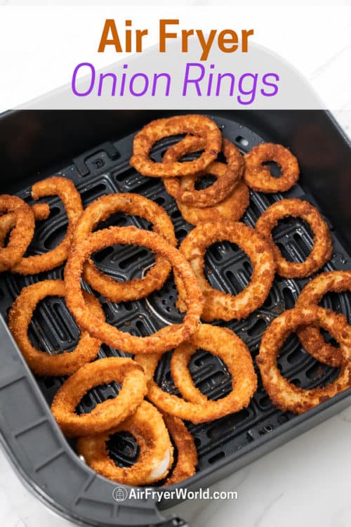 onion rings in an air fryer basket