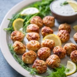 air fried greek keftedes on plate with tzatziki