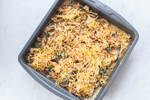 Fried onions and cheese topped over green beans
