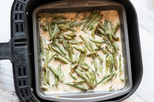 Green beans after being air fried with sauce