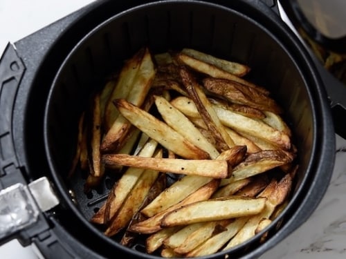 Air fried fries in air fryer basket