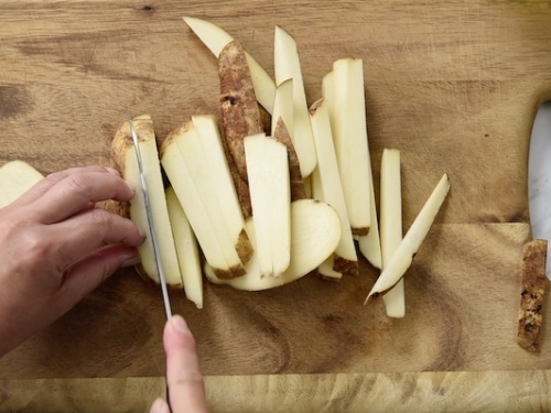 Cutting potato into sticks