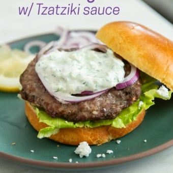 plate of air fryer greek lamb burgers with tzatziki