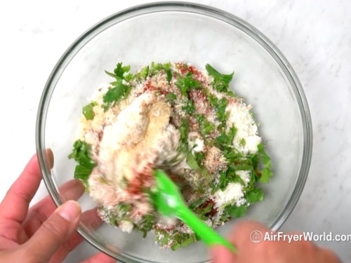 Mixing elotes dressing