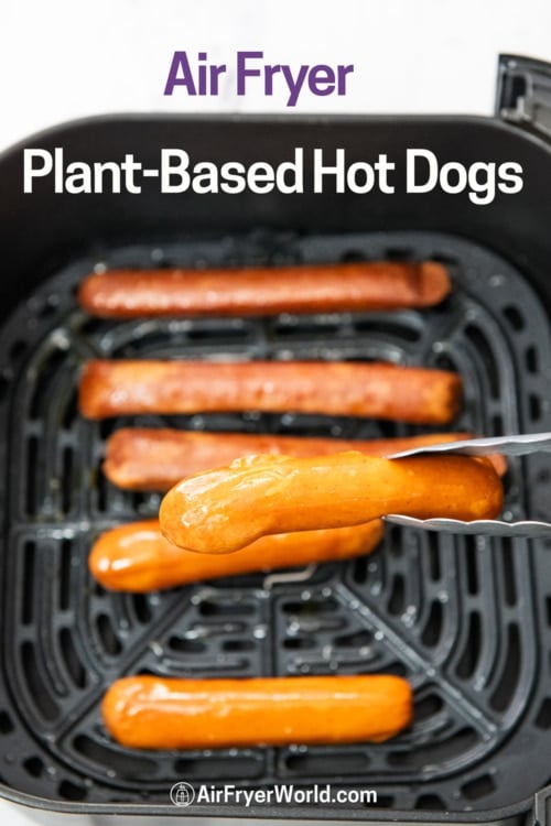 tongs holding air fryer plant based hot dog 