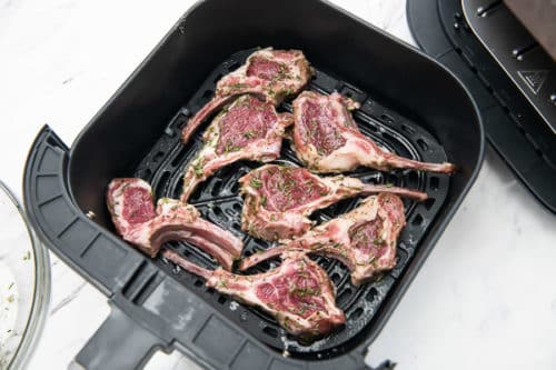 Uncooked lamb chops in air fryer