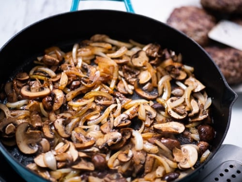 Onions and mushrooms in a skillet