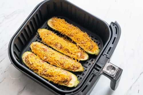 Stuffed zucchini in air fryer basket