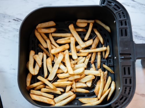 Cooked trader joes handsome cut potato fries in air fryer basket