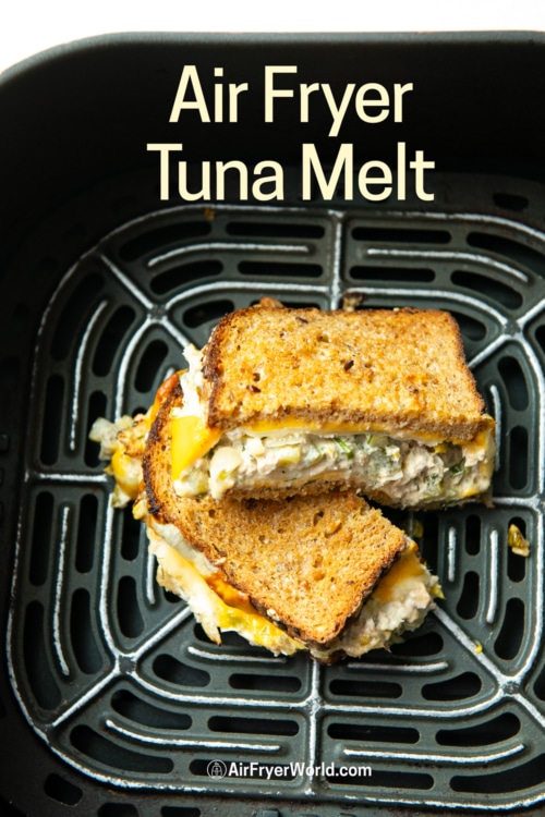 halved tuna melt sandwich in air fryer basket 