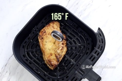 Cooked turkey breast with instant read thermometer