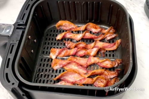 Cooked bacon twists in air fryer basket