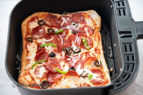 Cooked pizza in air fryer