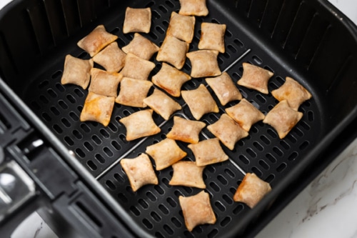 Cooked mini pizza rolls in air fryer