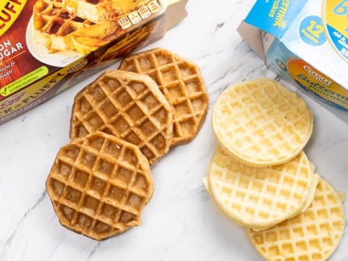 Frozen waffles next to packaging
