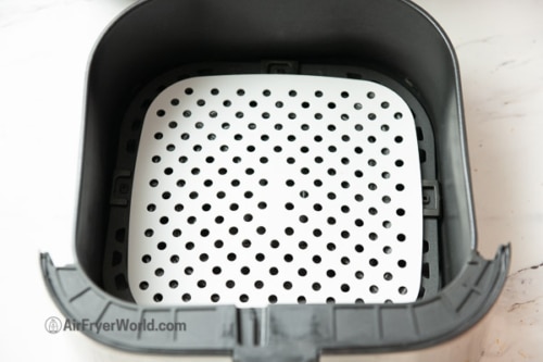 Silicone mat in air fryer basket