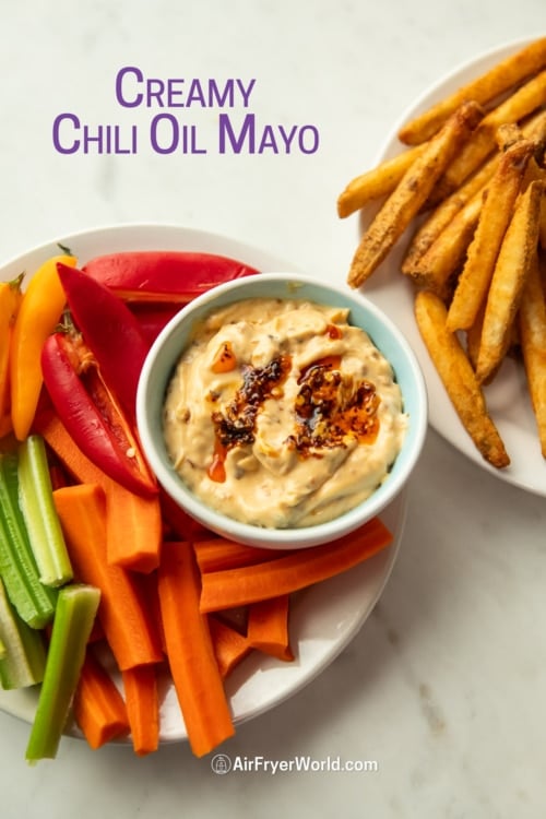 chili oil mayo with vegetables and fries on plate 