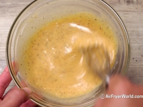 Whisking the sauce together