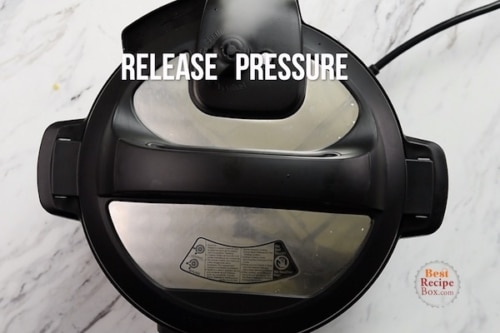 Steam releasing from pressure cooker