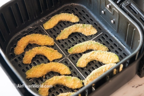 Uncooked avocado fries in air fryer