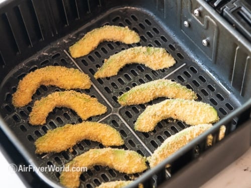 Uncooked avocado fries in air fryer