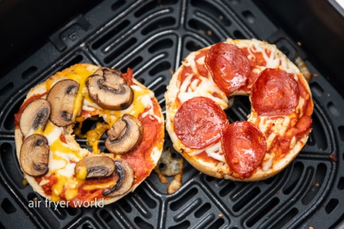 Cooked pizza bagel in air fryer