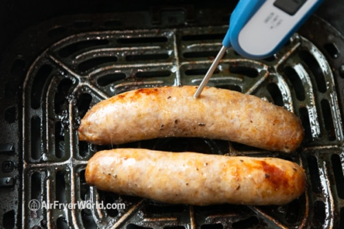 Testing temperature of bratwursts with an instant read thermometer