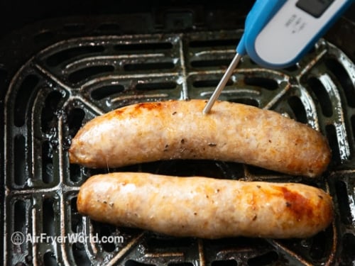 Testing temperature of bratwursts with an instant read thermometer