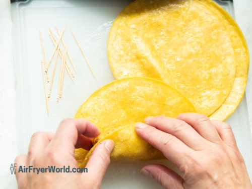 rolling corn tortilla