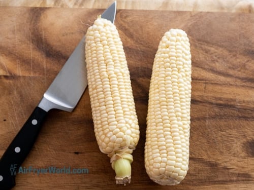 removed leaves and silk from whole corn
