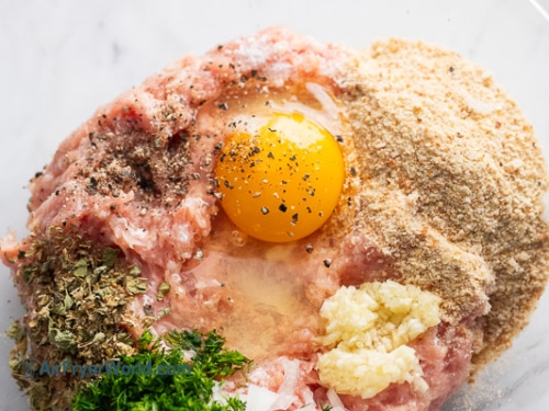 Meatball ingredients in a bowl