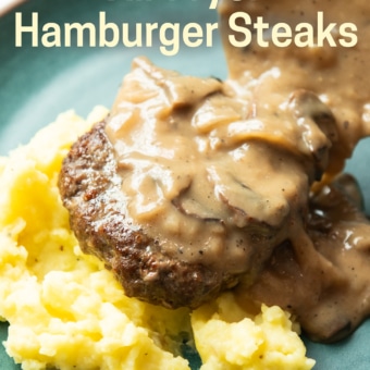 pouring gravy over air fryer hamburger steaks mashed potatoes