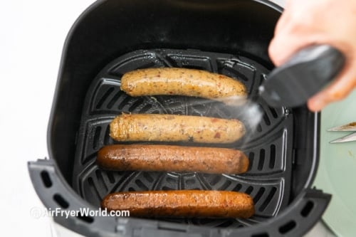 oil spray over plant based sausages