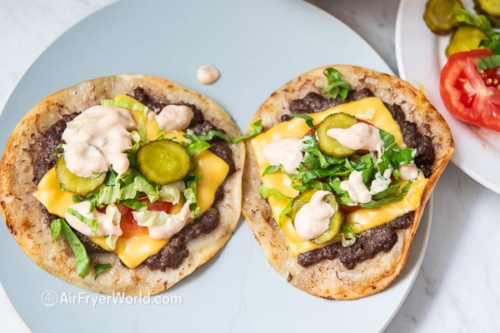 air fryer big mac taco with toppings on it