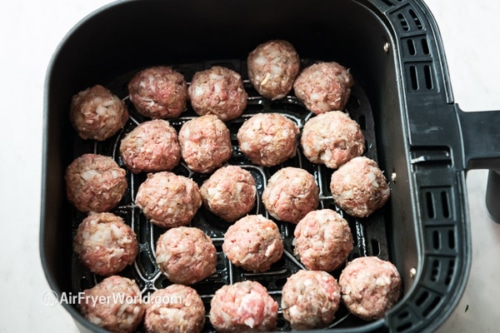 raw meatballs in air fryer basket