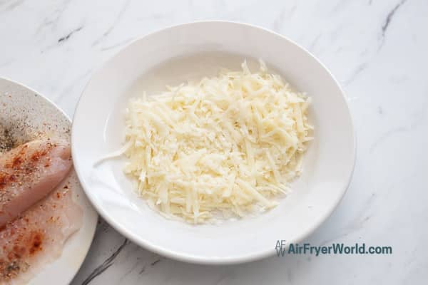 parmesan cheese in shallow bowl