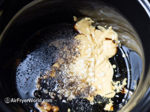 mixing sauce in cock pot